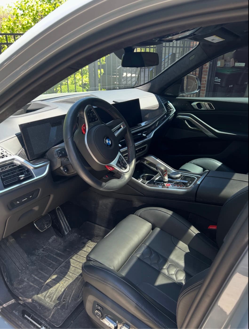 Front cabin of a BMW X6 M cleaned inside and out as part of a full mobile detail